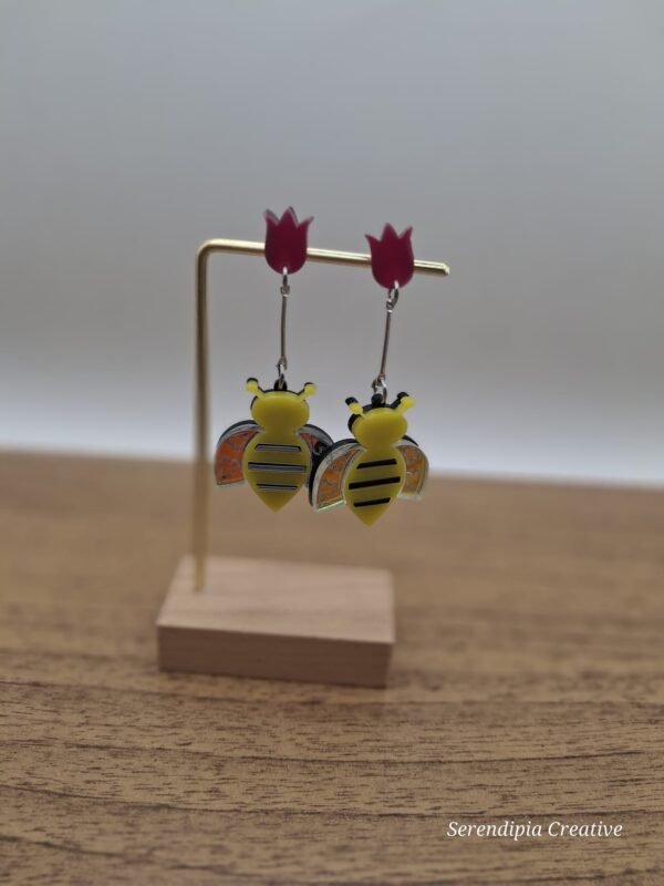 Pendiente abeja extensor